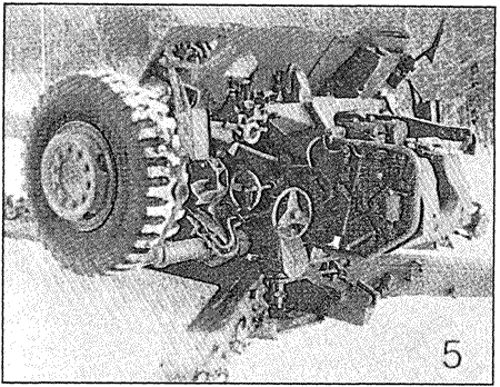 2A45M in firing position showing breech and fire controls