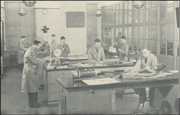 Photograph of technicians working in the FBI Technical Laboratory
