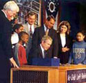 President Bush signing the "No Child Left Behind Act"