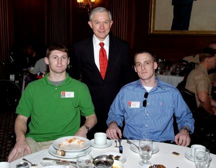Senator Sessions visits with United States Army Captains Jim Ollinger of Mobile, Alabama and Brian Jantzen of North Carolina during their visit to Capitol Hill.  These heroes were part of a group of special guests at a luncheon for severely wounded American servicemembers from Operations Enduring Freedom and Iraqi Freedom. (3/31/06)