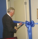 Hoyer cuts the ribbon officially opening Constellation Software Engineering Corporations new headquarters in Seabrook.