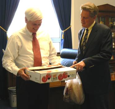 Photo, Frank presented Cong. John Duncan (R-TN), who represents UT, with Jersey tomatoes and "Fat Cat" sandwiches from the Rutgers University campus.
