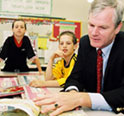This is an image of Congressman Baird reading to children.