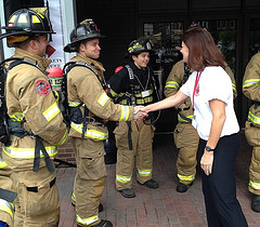 Senator Ayotte shakes hands with firefighters participating in the 2nd annual New Hampshire 9/11 Memorial Stair Climb.
