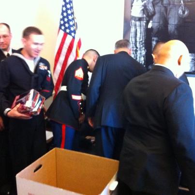 Photo: Members of the Marine Corps and the Marine Corps Reserves collect toys from staff members at Rep. McKinley's office in Washington, D.C.  Rep. McKinley conducts the toy drive every year for needy children.