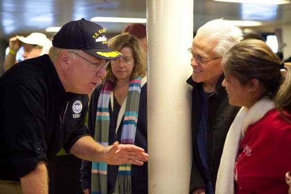 Federal Coordinating Officer (FCO) Mike Byrne meets with DHS volunteers berthing on the TS Kennedy