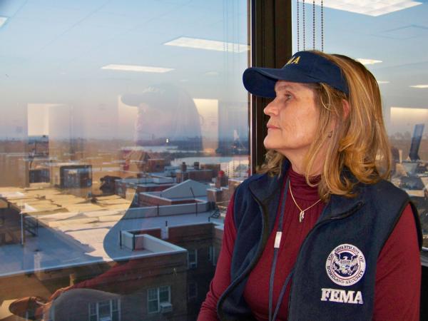 fema employee looks out window