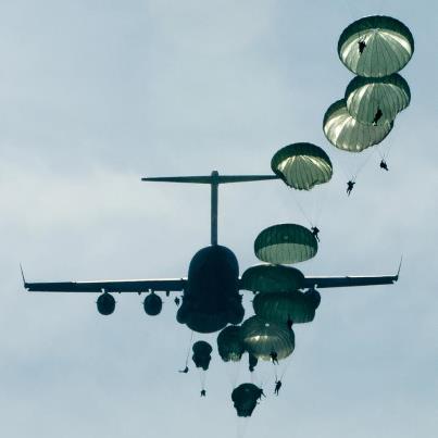 Photo: More than 1,600 paratroopers drop on Sicily Drop Zone during the 15th Annual Randy Oler Memorial Operation Toy Drop at Fort Bragg, N.C., Dec. 8. Toy Drop, hosted by the U.S. Army Civil Affairs & Psychological Operations Command (Airborne), is the largest combined airborne operation in the world.