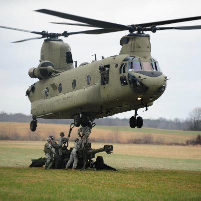 Photo: Soldiers from Bravo Battery, 4th Battalion, 320th Field Artillery Regiment, 4th Brigade Combat Team, 101 ABN DIV attach a M777 155mm howitzer to a CH-47 Chinook helicopter from 7-101st General Support Aviation Battalion, 159th Combat Aviation Brigade on Dec. 4, 2012, at Fort Campbell, Kentucky.