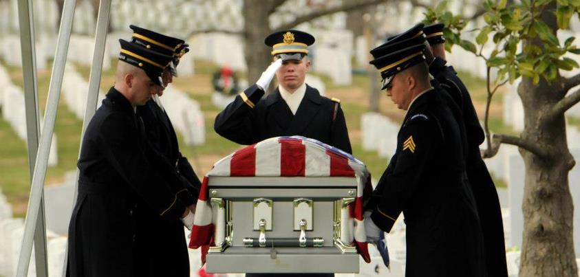Photo: Capt. Mike Mahowald, Bravo Company, 3d U.S. Infantry Regiment (The Old Guard), renders honors to the casket of Capt. James M. Johnstone during his funeral at section 60 in Arlington National Cemetery, Va., Dec. 12. Johnstone served as an aviator for the 20th Aviation Detachment. His remains were recently identified 46 years after his plane crashed in Attapu Province, Laos.   (U.S. Army Photo by Sgt. Jose A. Torres Jr.)