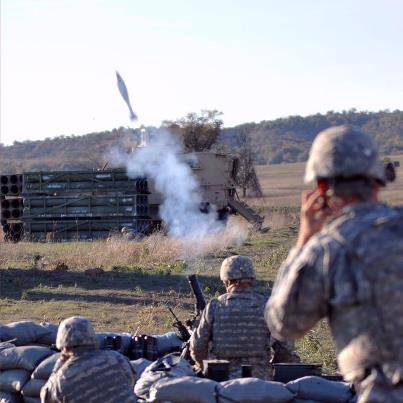 Photo: Soldiers from 2-2 Infantry Battalion launch a mortar during a combined-arms field training exercise, Nov. 2, on Fort Sill, Okla. The exercise included infantry, artillery and air-support elements. Photo by Staff Sgt. Timothy D. Hughes
