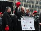 At the Consulate rally he led the crowd in support of Israel by leading the crowd in waving the red hat symbolizing the terrorist rocket fire raining down on Israel. He is flanked by Congress Members Peter King (l) and Steve Israel, both of Long Island.