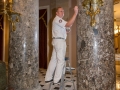 AOC employee working on touching up columns in Statuary Hall
