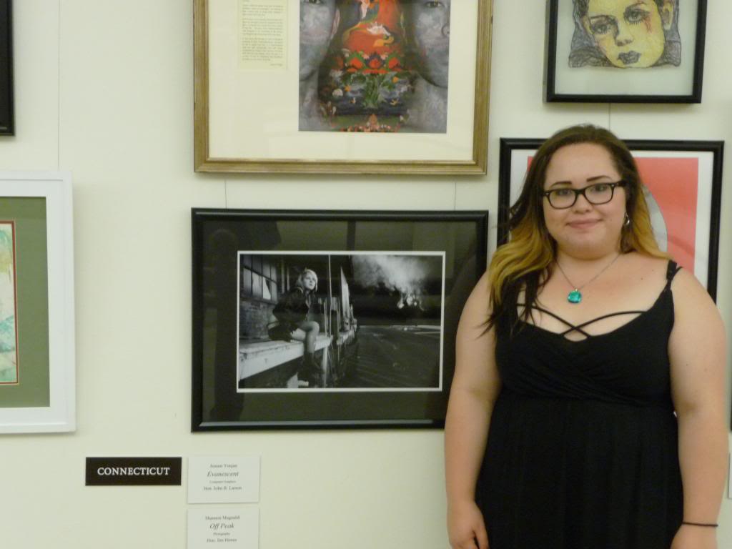 Shannon Magnaldi of Fairfield, the winner of the 2013 Congressional Art Competition, with her winning entry in the US Capitol. The photo hangs in a hallway most Members of Congress use to go take votes.