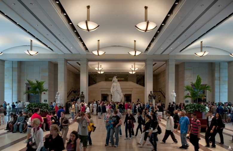 A crowd of visitors walking through the Capitol Visitor Center.