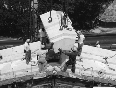 Setting a keystone during construction of the Rayburn House Office Building in 1964.