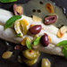 Spanish mackerel, here with with olives, almonds and mint, is very mild and quite tender.