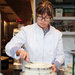 Elisabeth Prueitt, a pastry chef, icing a carrot teff cake at Tartine Manufactory, which she and her husband, Chad Robertson, opened this fall in San Francisco.