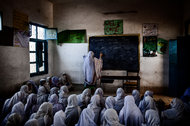 Girls attending school in Nowshera, Pakistan, in 2013.