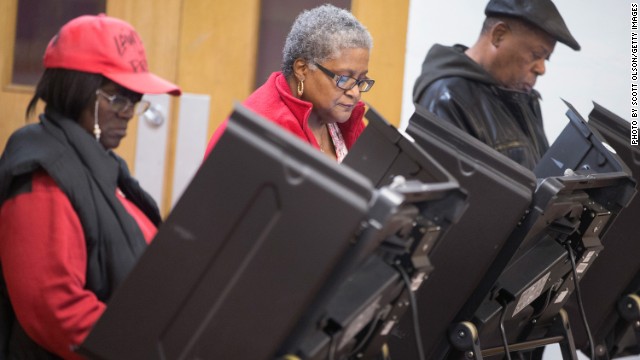 FERGUSON, MO - NOVEMBER 04: Residents cast their votes at a polling place on November 4, 2014 in Ferguson, Missouri. In last Aprils election only 1,484 of Ferguson&#39;s 12,096 registered voters cast ballots. Community leaders are hoping for a much higher turnout for this election. Following riots sparked by the August 9 shooting death of Michael Brown by Darren Wilson, a Ferguson police officer, residents of this majority black community on the outskirts of St. Louis have been forced to re-examine race relations in the region and take a more active role in the region&#39;s politics. Two-thirds of Fergusons population is African American yet five of its six city council members are white, as is its mayor, six of seven school board members and 50 of its 53 police officers. (Photo by Scott Olson/Getty Images)