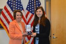 Congresswoman Pelosi presents Claire Dashe, 2015 Bronze Congressional Medal Awardee, with her award in San Francisco