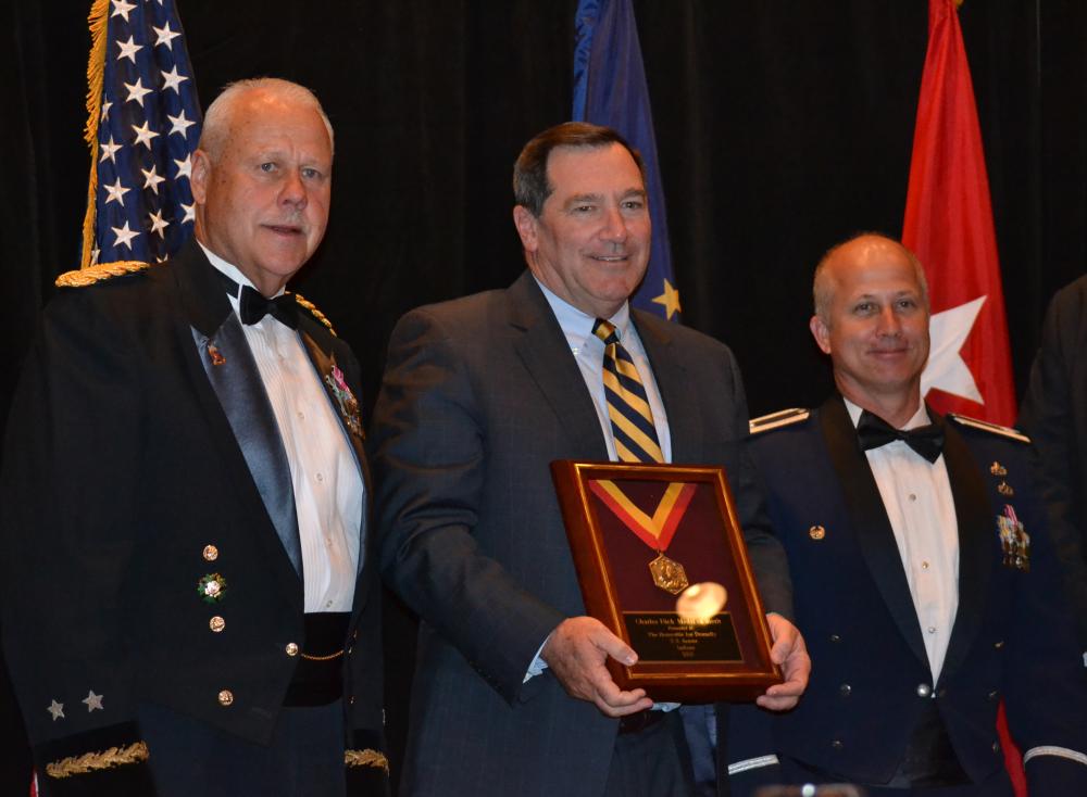 Senator Donnelly Awarded Charles Dick Medal of Merit