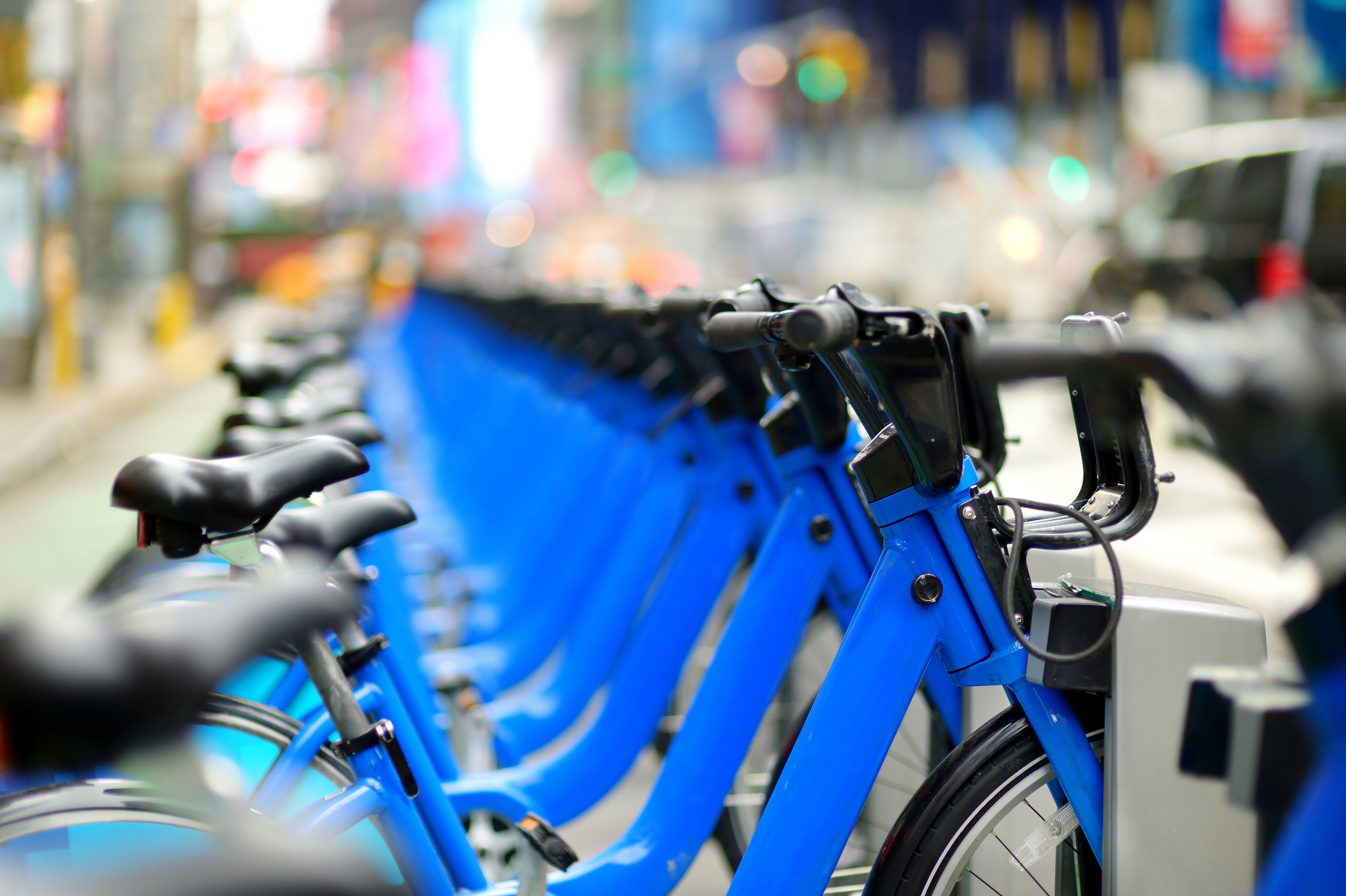 blue bike-share bikes in their rack