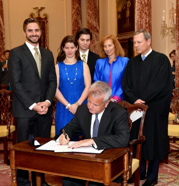 Date: 06/09/2017 Description: With his family and U.S. Chief Justice John G. Roberts Jr. looking on, John Sullivan signs his appointment papers to become the new Deputy Secretary of State at a ceremony at the U.S. Department of State in Washington, DC. - State Dept Image