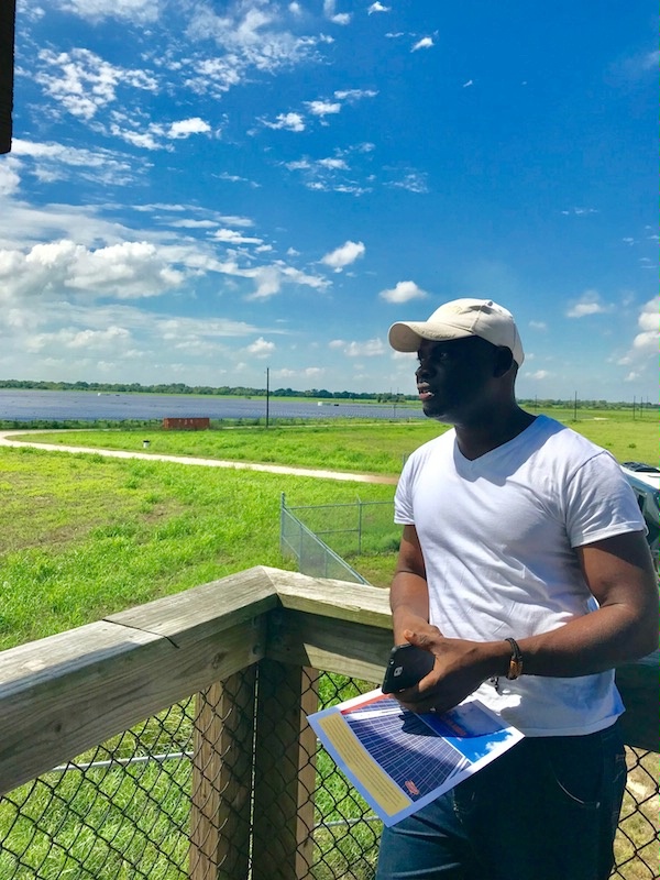 A student at ENR's Texas Power Workshop visits a solar farm in Texas. The workshop brought together representatives from different U.S. government agencies to learn how Texas becoming a business-centered, market-driven, transparent energy sector, which successfully adapted to a highly diversified generation portfolio with fossil and renewable energies.