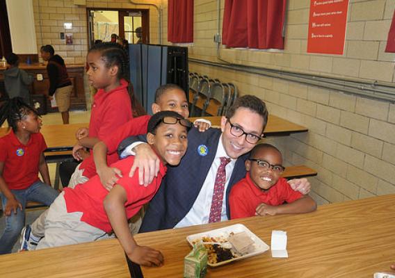 Acting Deputy Under Secretary for Food, Nutrition and Consumer Services Brandon Lipps joining students for a healthy school meal