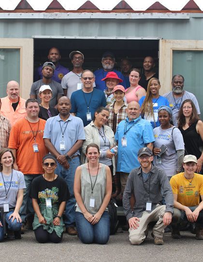 Participants and instructors after lunch at Eco City Farm.