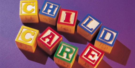 The words "Child Care" spelled out in children's letter blocks