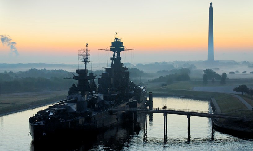 Battleship Texas with San Jacinto Monument in the background
