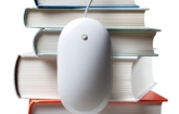 Stack of Books with a computer mouse: Copyright iStock Photos
