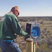 USGS hydrologic technician collecting groundwater level data
