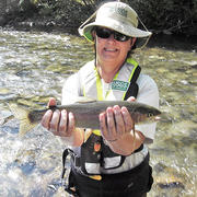 USGS biologist with rainbow trout from the Big Wood River, Idaho