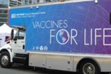 Photo of Vaccine Research Center truck with logo: Vaccines for Life