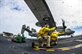 U.S. Navy Lts. Zachary Holbus, foreground, and Keith Ferrell launch an E-2C Hawkeye aircraft from the flight deck of the USS George Washington during Talisman Sabre 2015 in the Timor Sea, July 10, 2015. The bilateral exercise demonstrates the strong Australian-U.S. alliance and military relationship. The Hawkeye is assigned to  Airborne Early Warning Squadron 115.U.S. Navy photo by Petty Officer 3rd Class Bryan Mai 