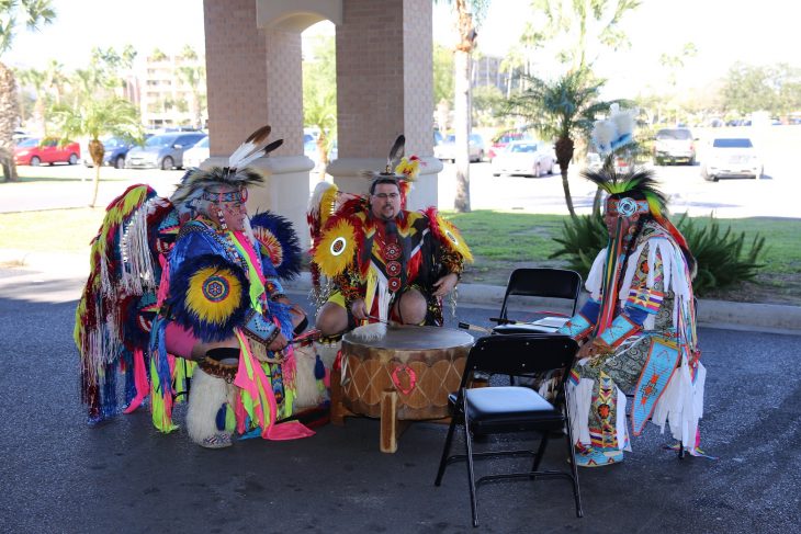 Member of the Lipan Apache Tribe of Texas perform by playing and singing inside a drum circle during a special event in observance of National Native American Heritage Month, which took place at the VA outpatient clinic in Harlingen, Texas, on November 16, 2018. (U.S. Department of Veterans Affairs photo by Luis H. Loza Gutierrez)
