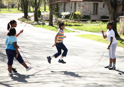 Four girls jumping rope