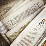 Press Releases - image of newspapers
