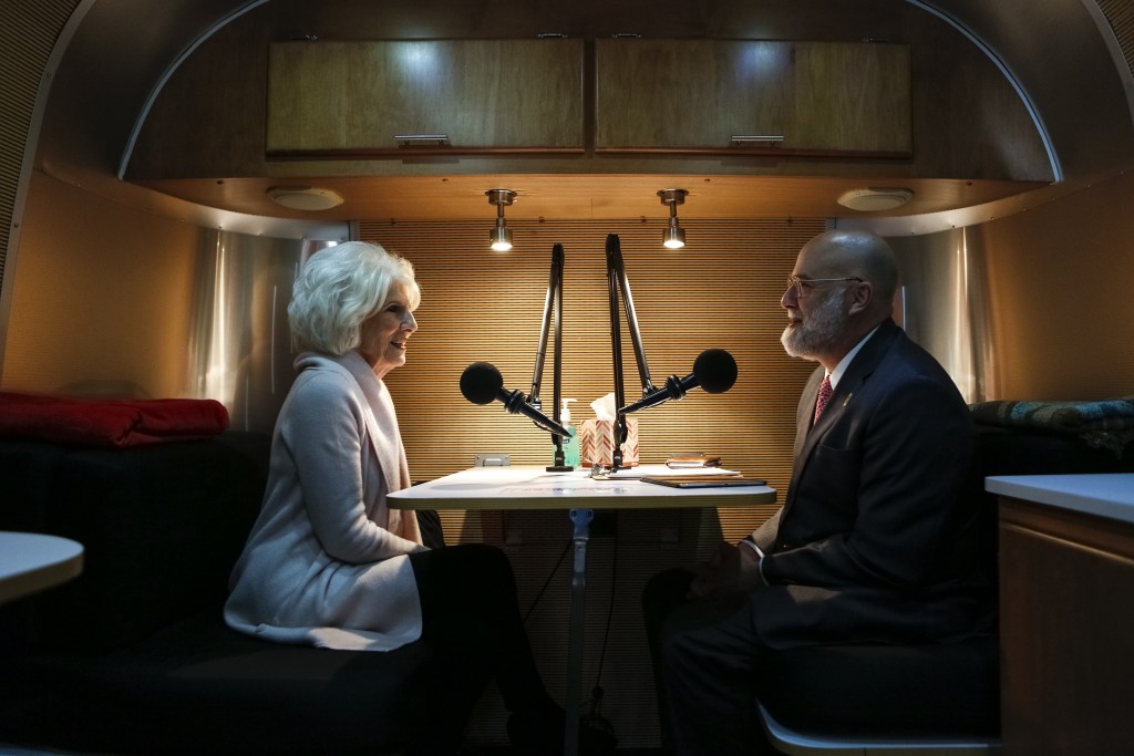 NPR host Diane Rehm and her son David conduct an interview in the StoryCorps MobileBooth. Photo by Shawn Miller.