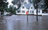 House and street intersection under flood waters