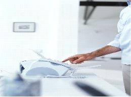 Decorative image of a person submitting a fax
