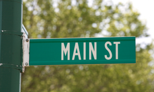 Green sign with "Main St" text: Copyright iStock Photos