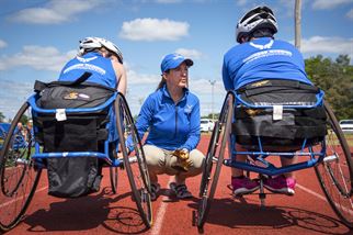 Warrior Games coach Teresa Skinner talks with athletes at track and field practice during the Air Force team’s Warrior Games training camp at Eglin Air Force Base, Fla., April 26, 2017. The weeklong camp is the last team practice session before the yearly competition in June. Air Force photo by Samuel King Jr.