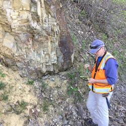 Greg Walsh using digital geologic mapping techniques to measure fault in Champlaign Valley, NY