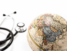 Decorative image of a globe with a stethoscope.