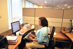 OASCR employee working on her computer