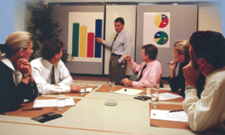 Office workers attending a meeting